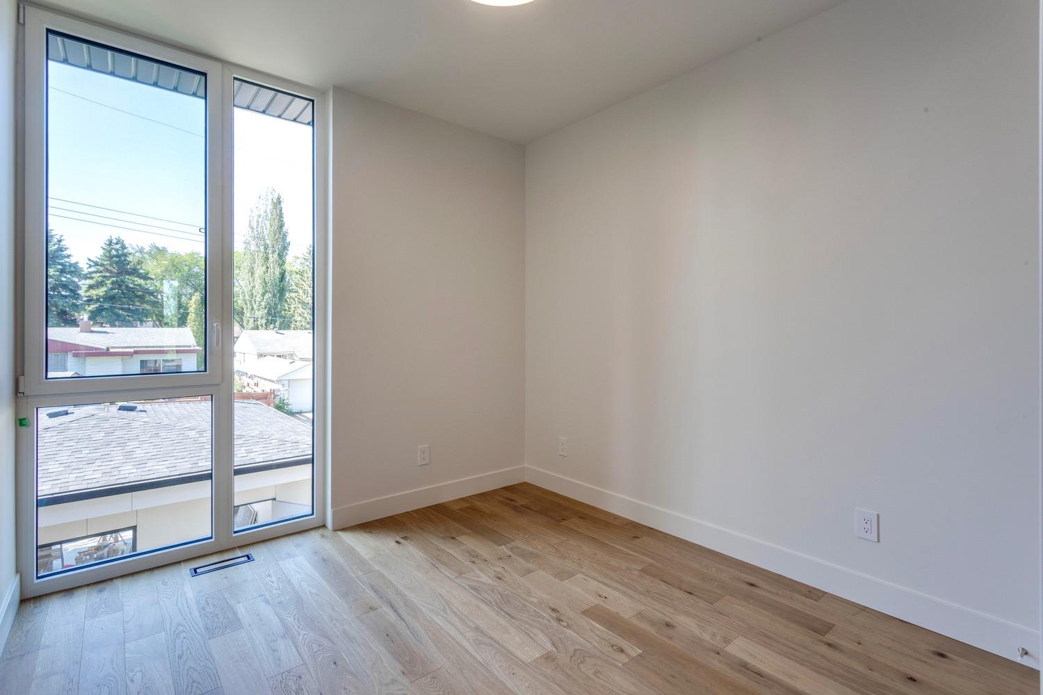 Bedroom in the Aspen in Strathearn with homes for sale by Holland and Associates Real Estate in Edmonton.